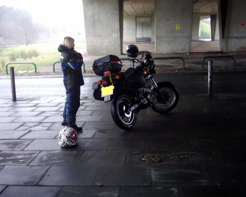 my gf and bike parked under the motorway bridge at preston